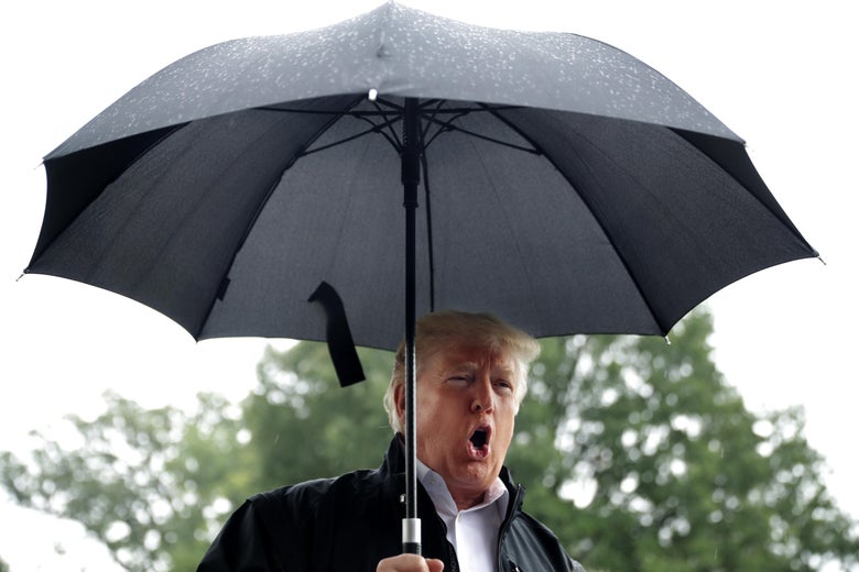 WASHINGTON, DC - OCTOBER 15: U.S. President Donald Trump talks to reporters before leaving the White House October 15, 2018 in Washington, DC. The president and first lady Melania Trump are traveling to survey damage from Hurricane Michael, the most powerful storm ever recorded to strike the Florida panhandle. (Photo by Chip Somodevilla/Getty Images)
